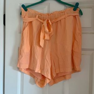 Torrid Brand women’s Peach dress shorts. Size 00. Brand new never worn